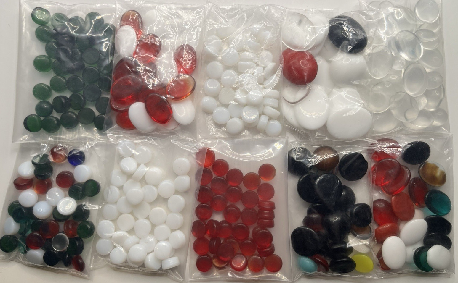 Lot of 200+ round, oval White, Clear, Red, Green Glass Cabochons